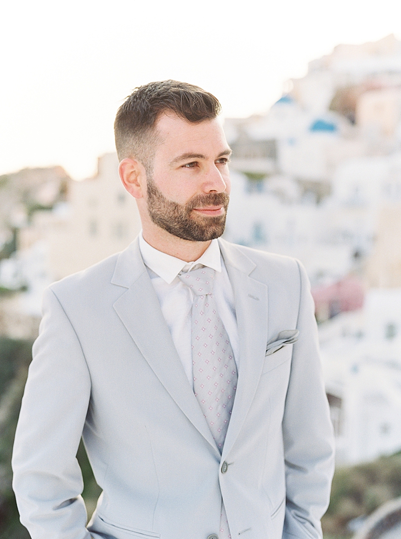 Oia Santorini Greece Destination Wedding Island Elopement, Film Photography, groom in light gray suit and tie