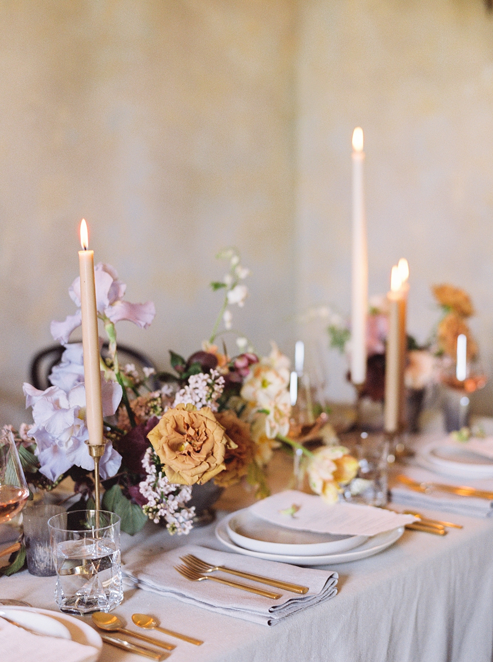 fall wedding tablescape, spring wedding, Charlottesville Virginia wedding photographer, wedding centerpiece, purple yellow pink rust tulips hellebore wedding flowers, wedding table with candles