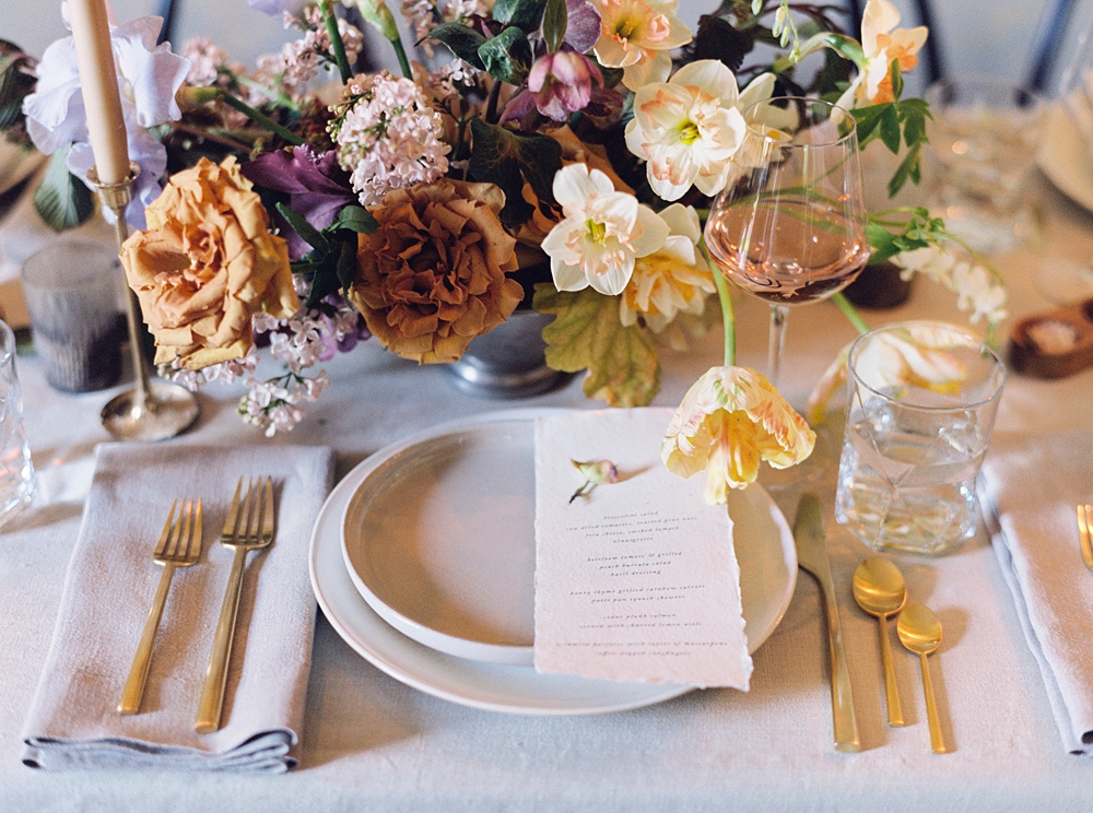 wedding reception table decor, spring flower centerpiece, fall wedding flowers, Charlottesville wedding photographer, muted wedding colors, colorful wedding flowers, handmade calligraphy wedding menus