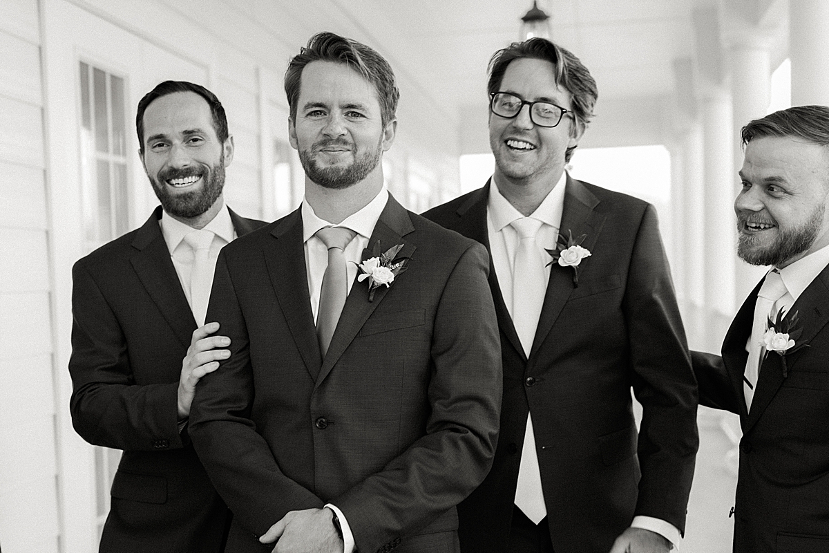 Groom with groomsmen wedding photography, black and white film wedding photo
