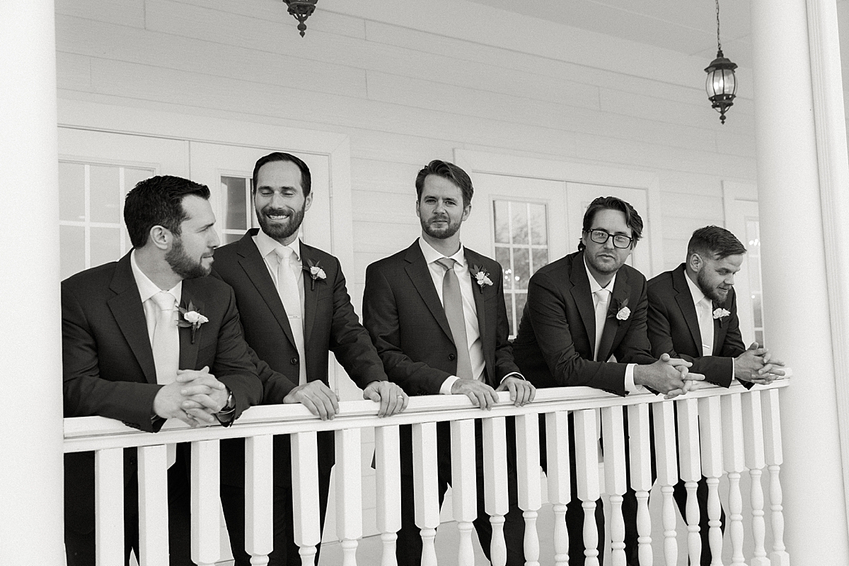 Groom with groomsmen wedding photography, black and white film wedding photo