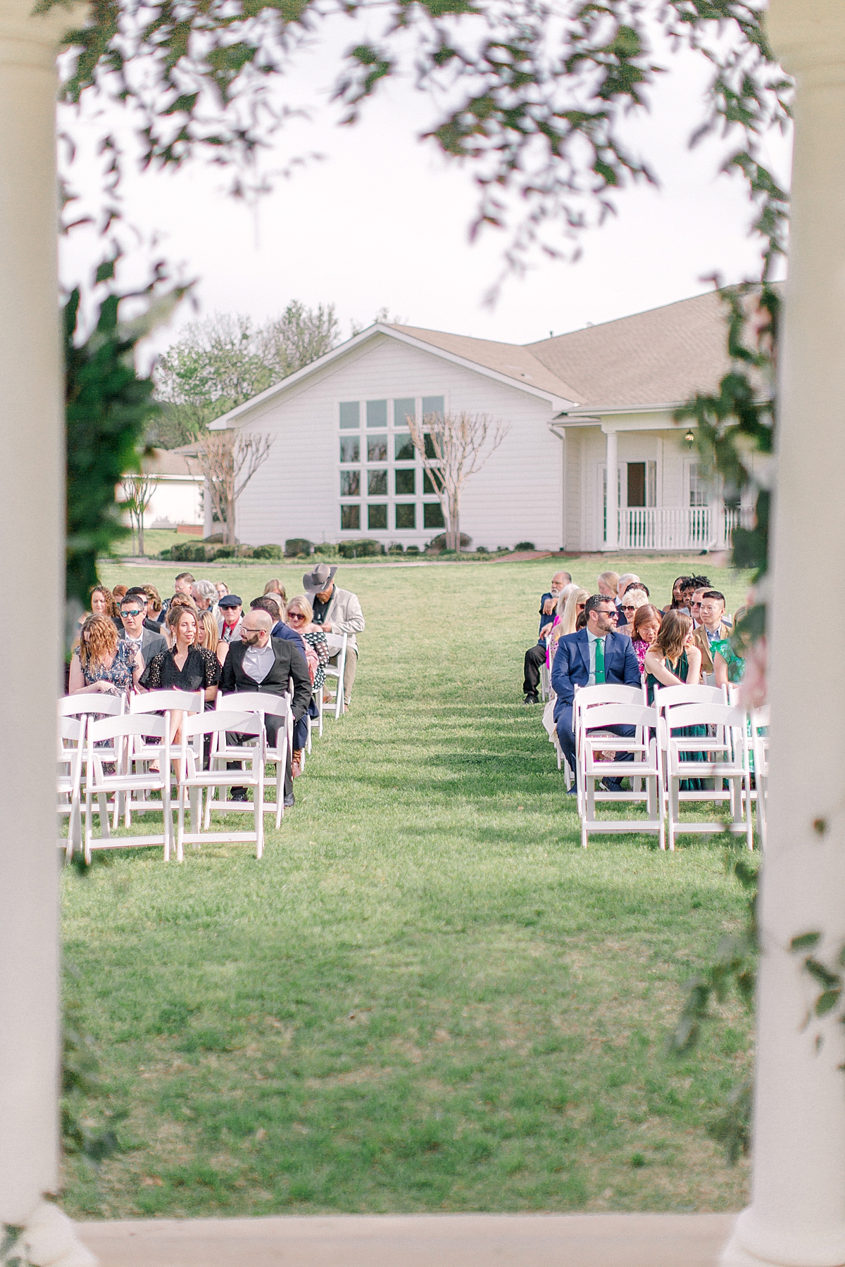 Guests seated during outdoor wedding ceremony outside of DFW area wedding