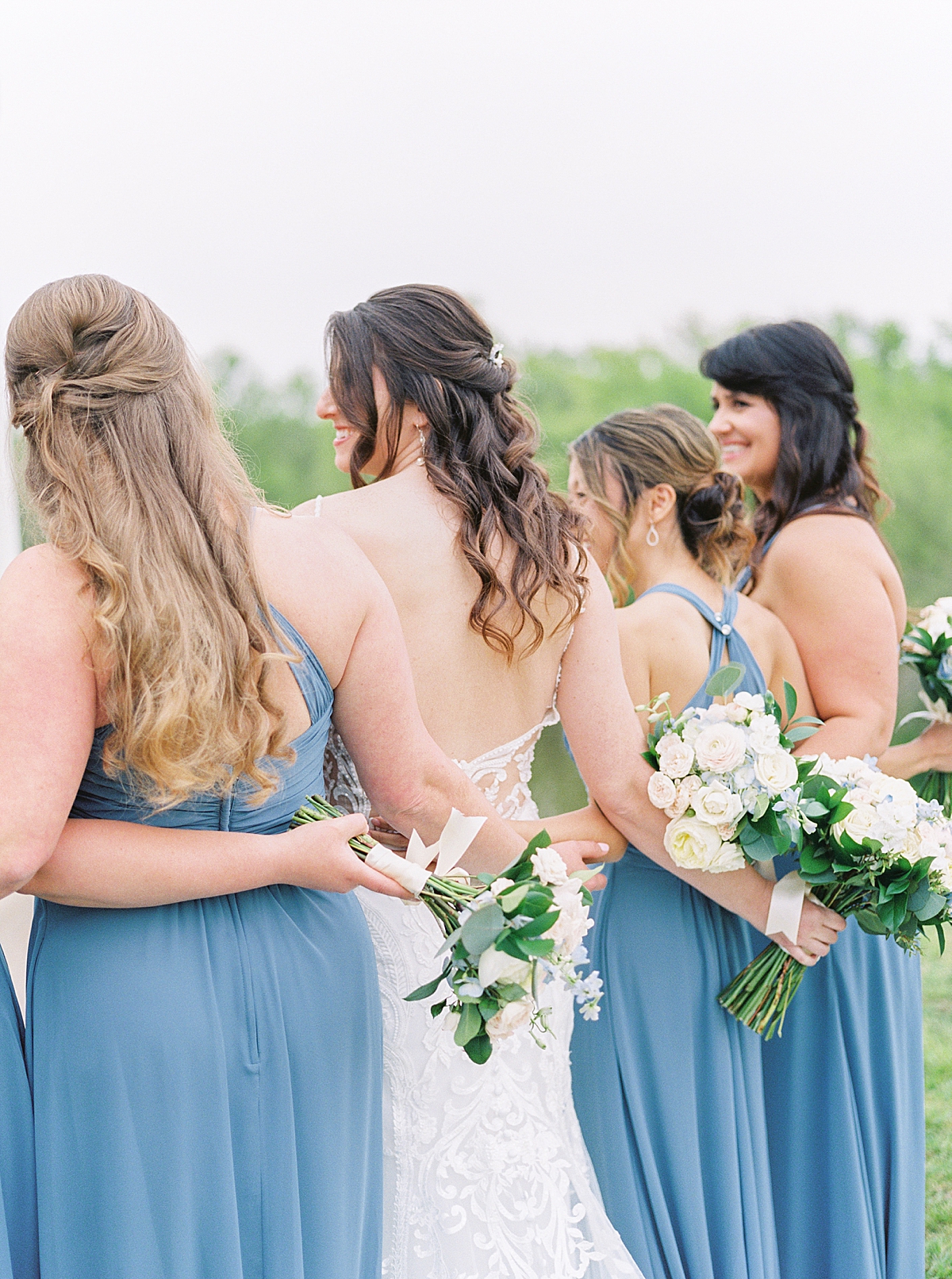 White wedding flowers, bridal bouquets, white and pink roses bouquet, blue bridesmaid dress