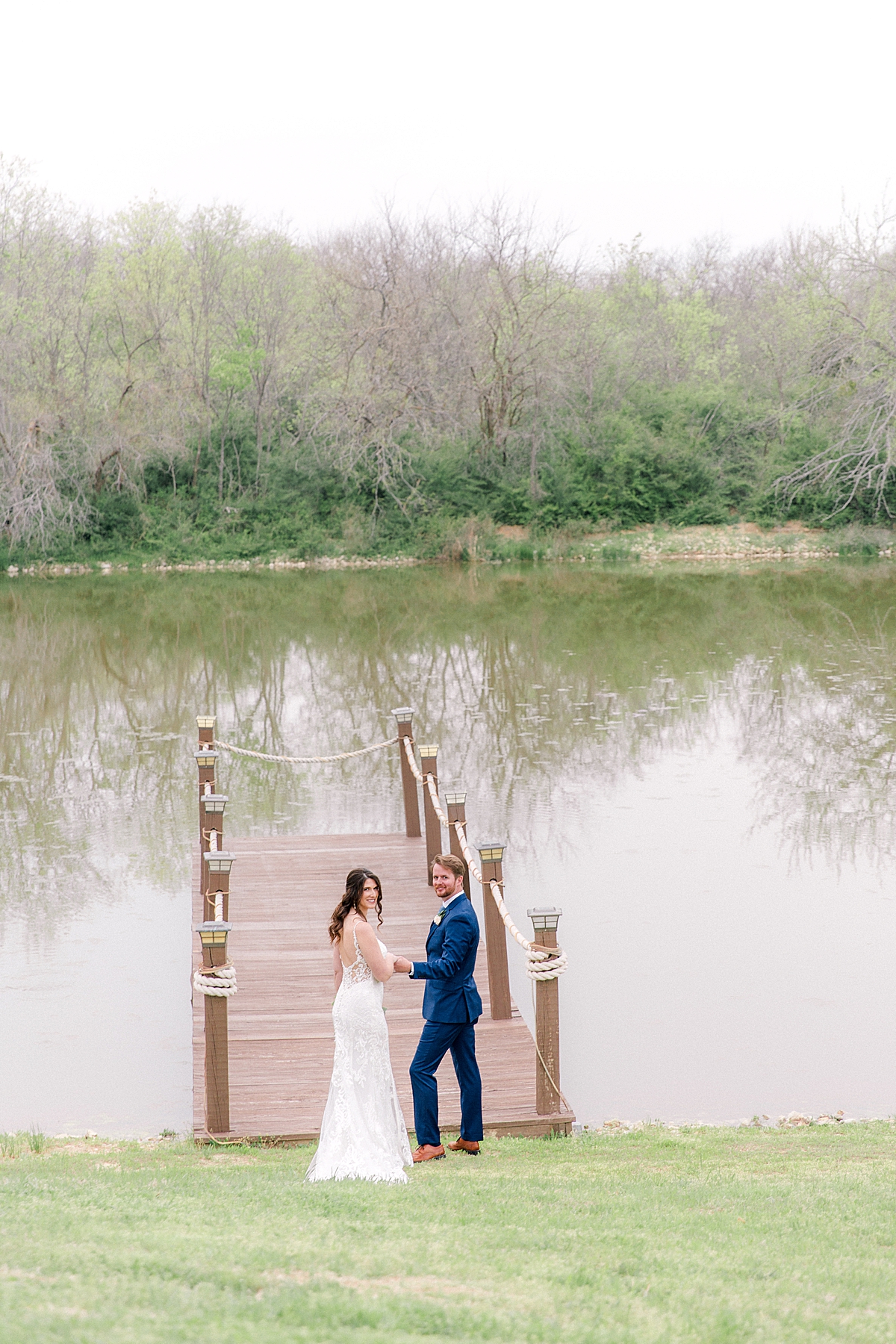 Fine art film wedding photography, bride and groom on Bridge over pond for outdoor wedding ceremony, Milestone mansion wedding