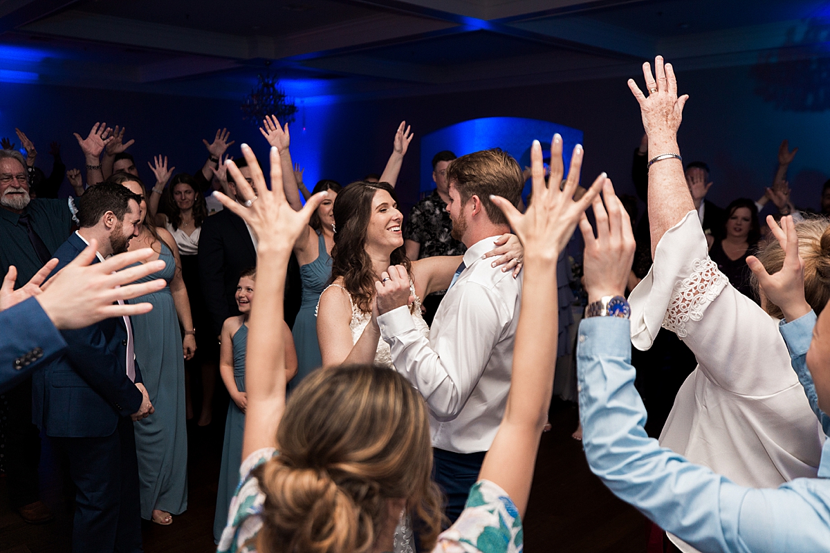 Bride and groom dancing at wedding reception