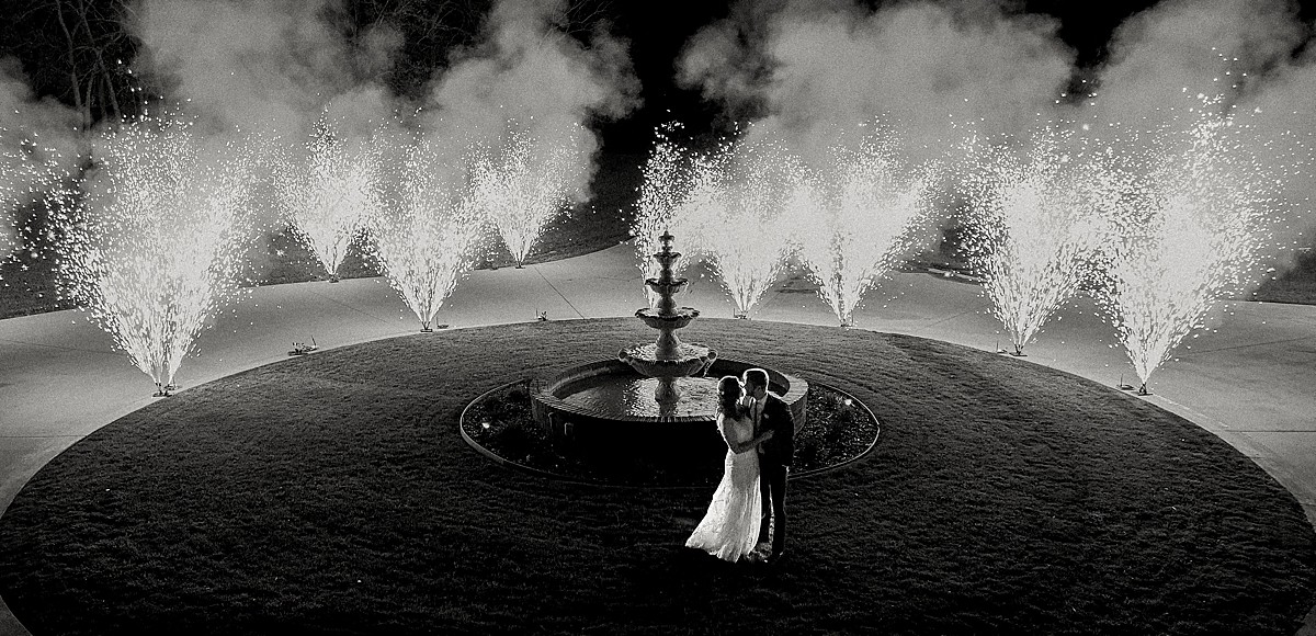 Bride and groom wedding grand send off fireworks, black and white wedding photography